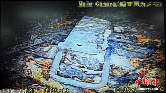 資料圖：日本向福島第一核電站1號機(jī)組的反應(yīng)堆安全殼內(nèi)投入的棒狀機(jī)器人，拍攝了反應(yīng)堆圖片。